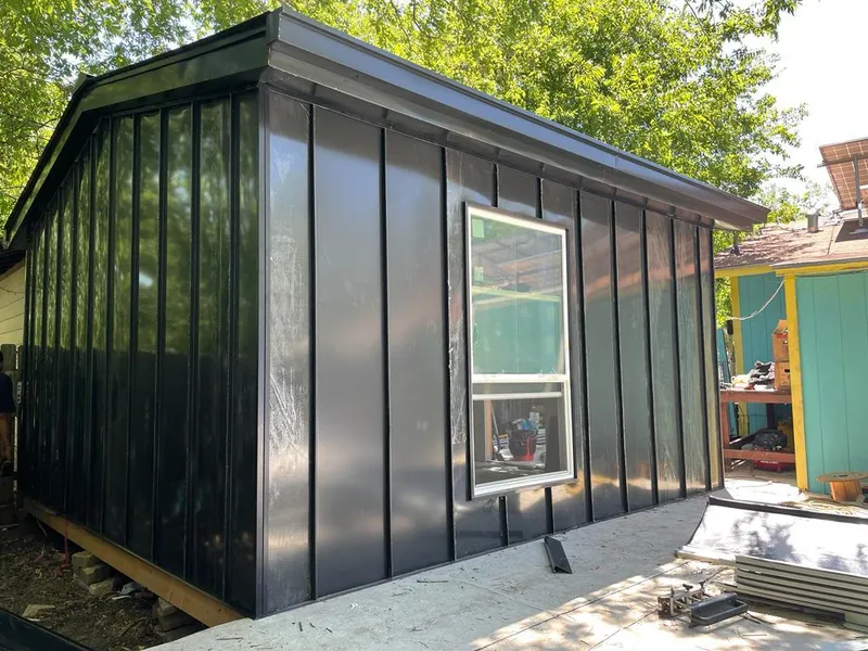 Black standing seam metal wall panels for Roof Inspection in Fair Lawn