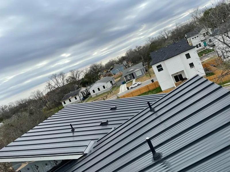 Standing seam metal roof panels with vents for Skylight Repair in Fair Lawn